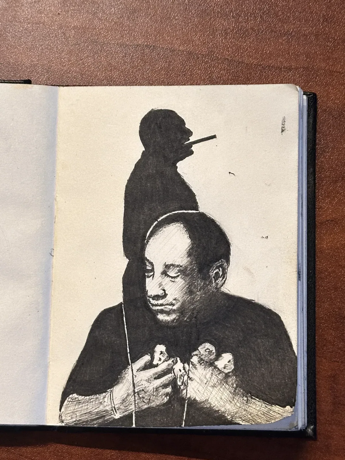 Ballpoint portrait study with a smoking silhouette in the background